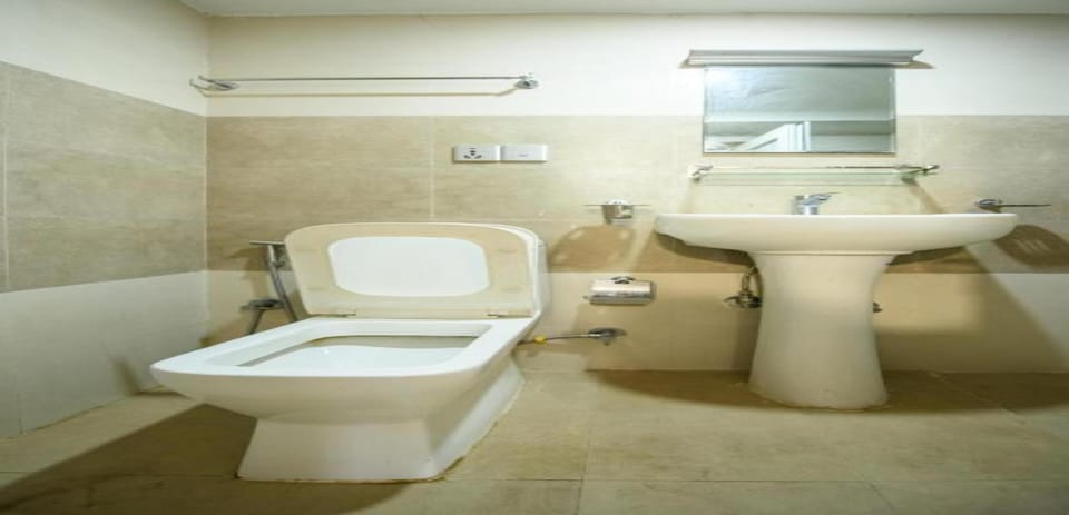 Shower, rainfall showerhead, towels, soap