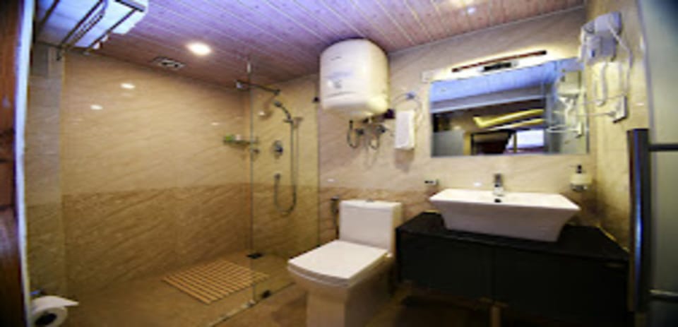 Shower, rainfall showerhead, towels, soap