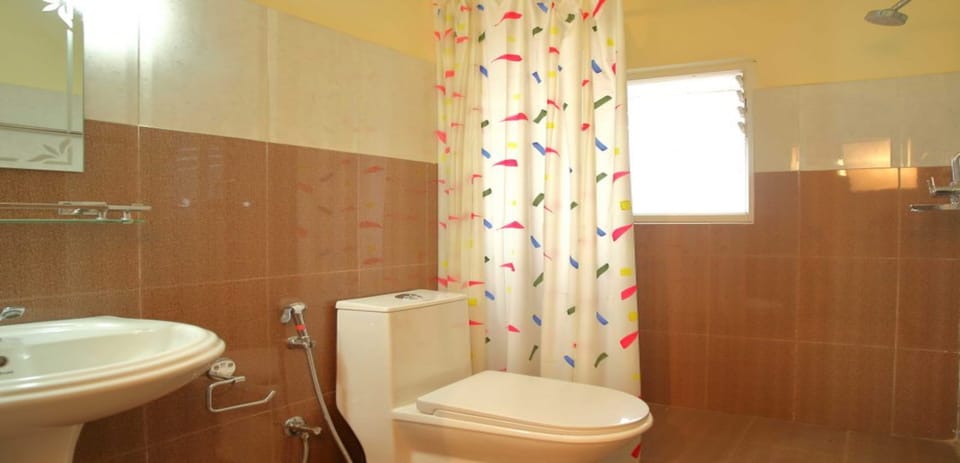 Shower, rainfall showerhead, towels, soap