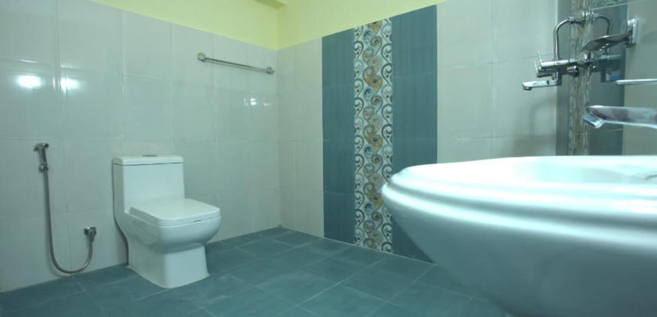 Shower, rainfall showerhead, towels, soap