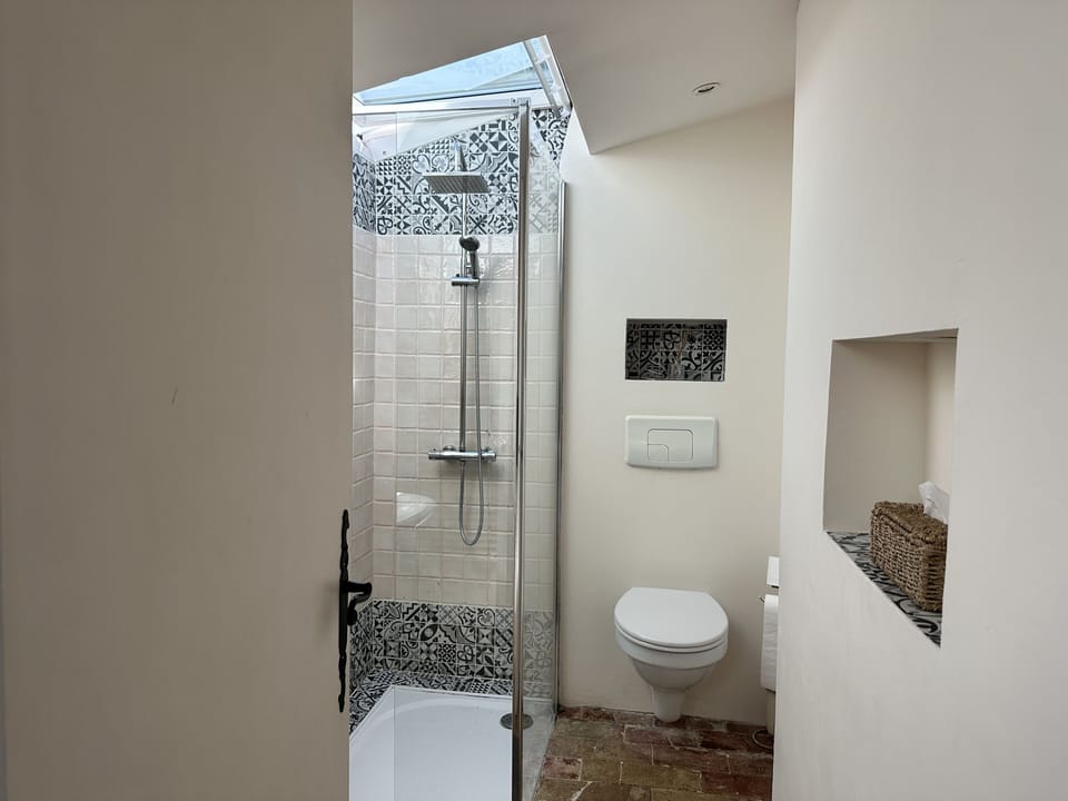 Classic Suite (Sous les toits de provence) | Bathroom | Shower, hair dryer, towels, soap