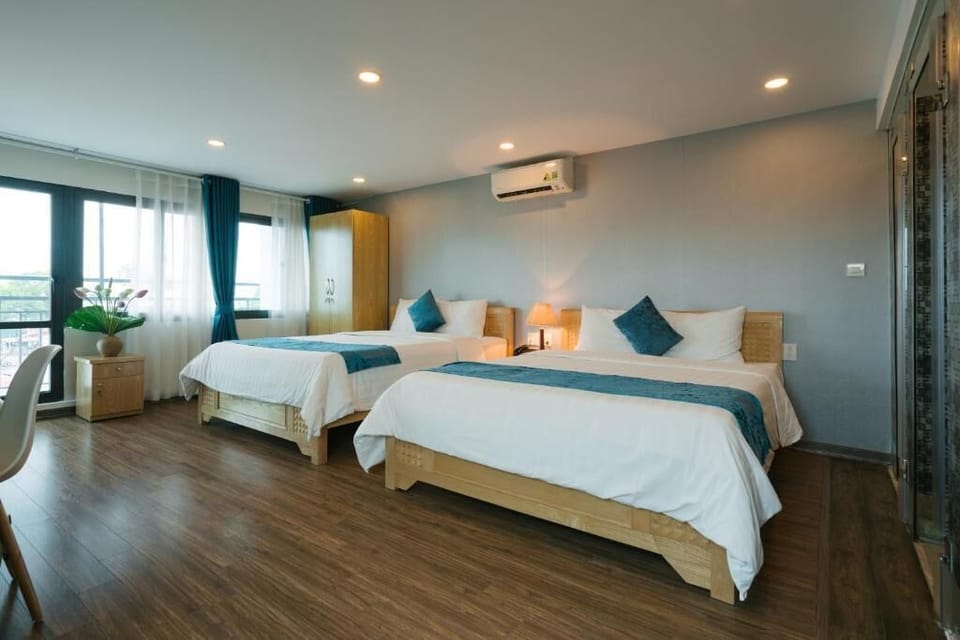 Family Room | Premium bedding, down comforters, individually decorated