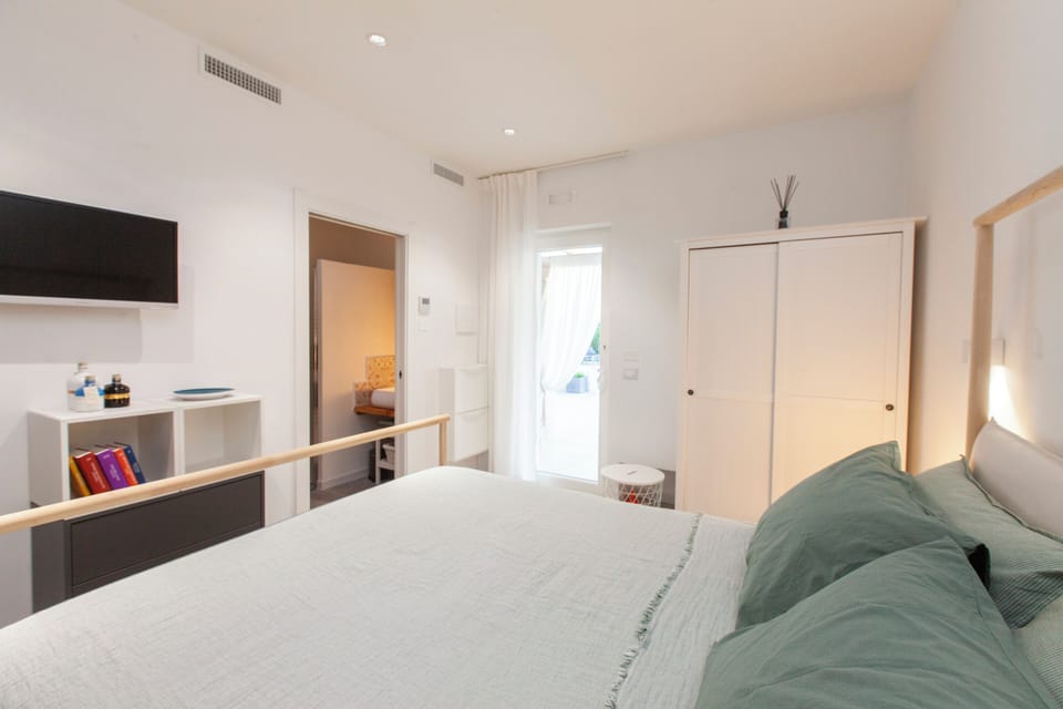 Olive | Premium bedding, down comforters, minibar, in-room safe