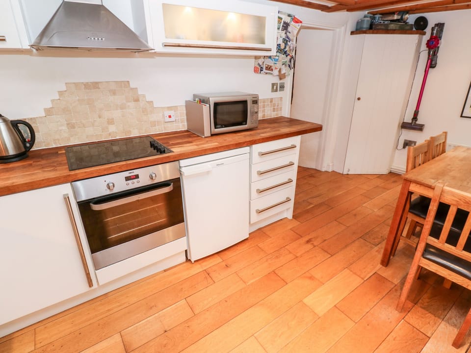 Fridge, electric kettle, toaster, cookware/dishes/utensils