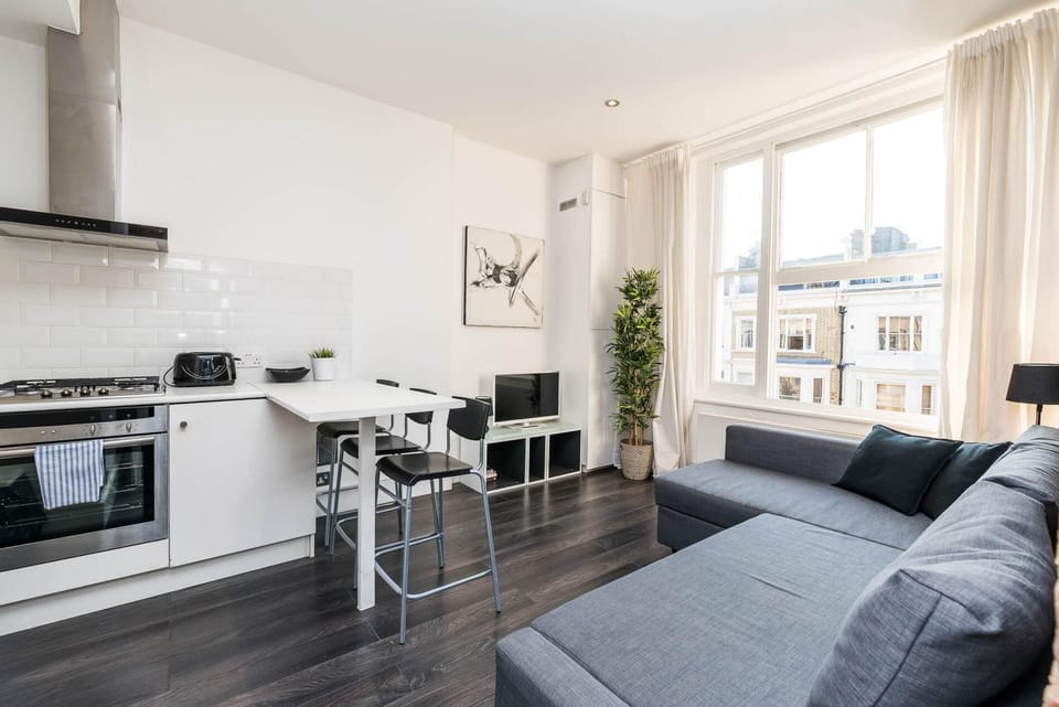Apartment (1 Bedroom) | Living area | Flat-screen TV