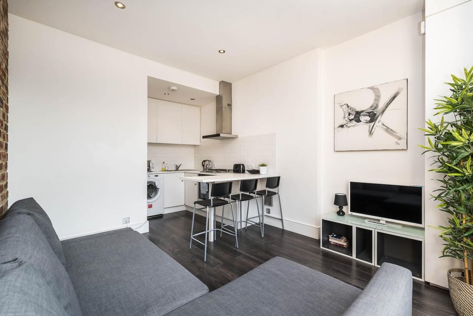 Apartment (1 Bedroom) | Living area | Flat-screen TV