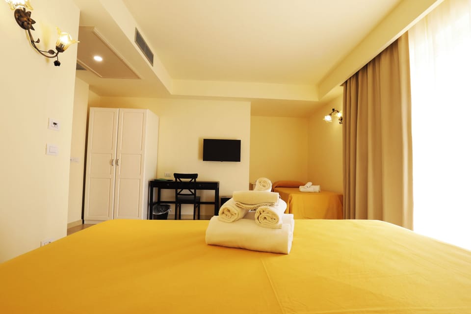 Triple Room | Hypo-allergenic bedding available, minibar, desk, soundproofing