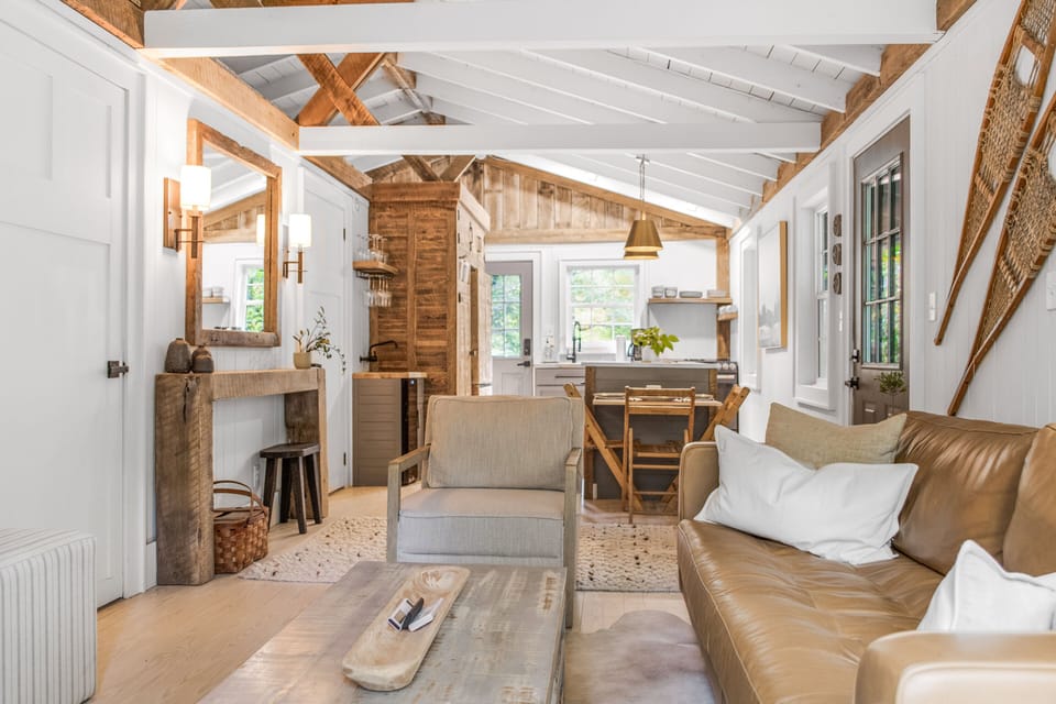 Open-concept floor plan with natural light flooding in throughout.