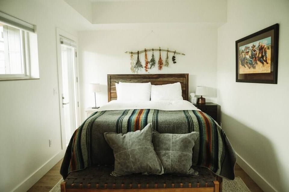 Bedroom 2 - furnished with custom art and a bed you will melt in.