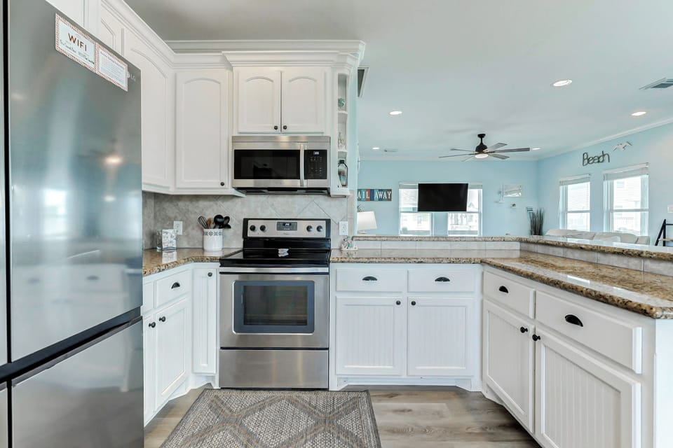 Kitchen Delight: Modern appliances and sunny vibes await your culinary adventures!