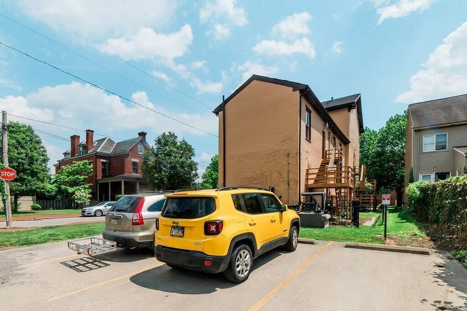 On lot, free parking spot! This apartment comes with one spot out back, and in the front there is unlimited free street parking that is readily available 