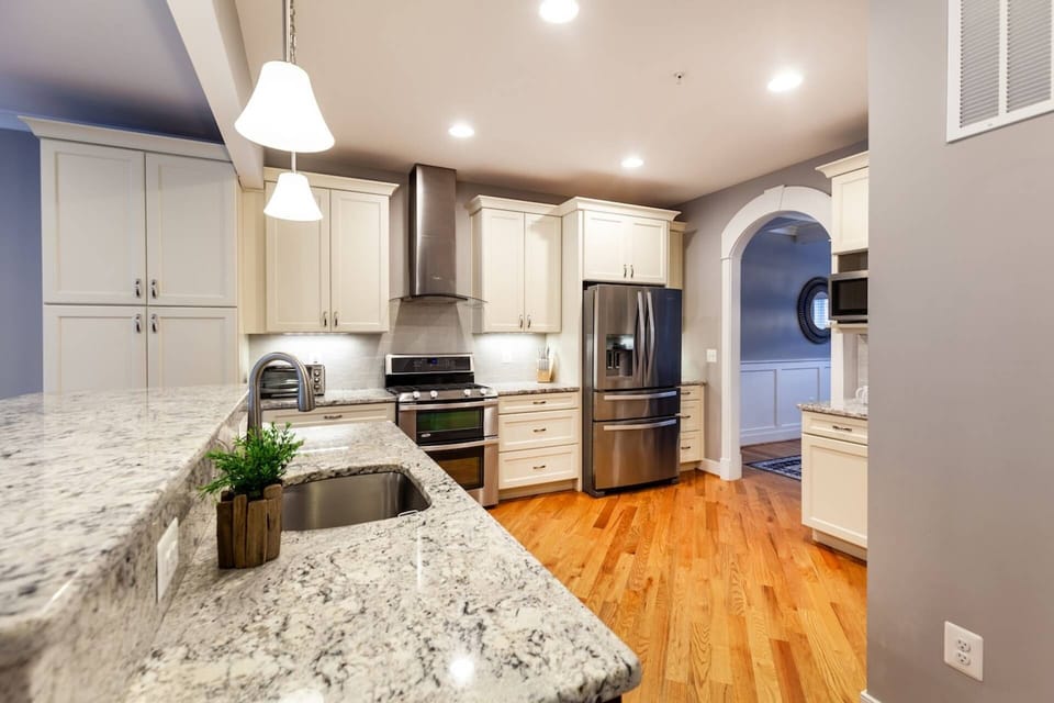 The gourmet kitchen has multiple prep counter spaces.