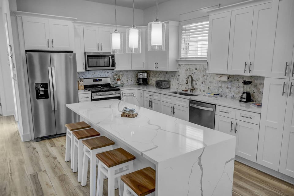 Gorgeous well appointed kitchen with expansive island!