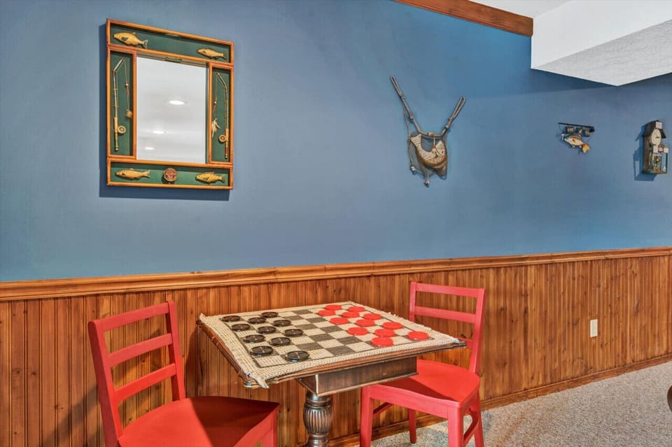The game room features a variety of activities, from ping pong to board games, for endless fun.