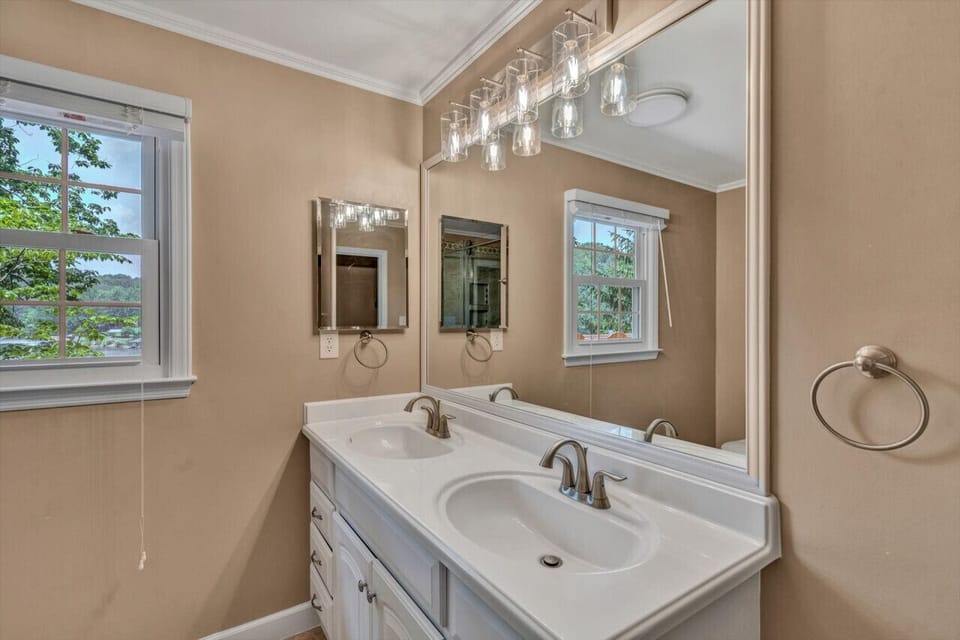 Convenient bathroom off the living area, perfect for easy access and accommodating guests.