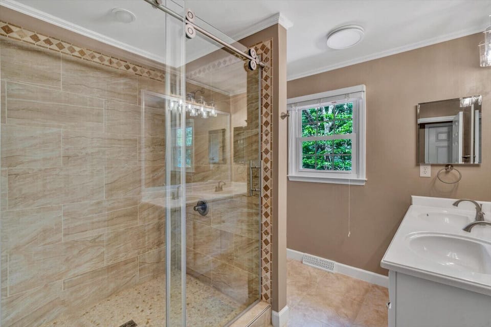 Convenient bathroom off the living area, perfect for easy access and accommodating guests.