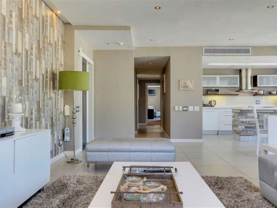 Two Bedroom Platinum Apartment | Living area | 74-inch flat-screen TV with satellite channels, TV, Netflix