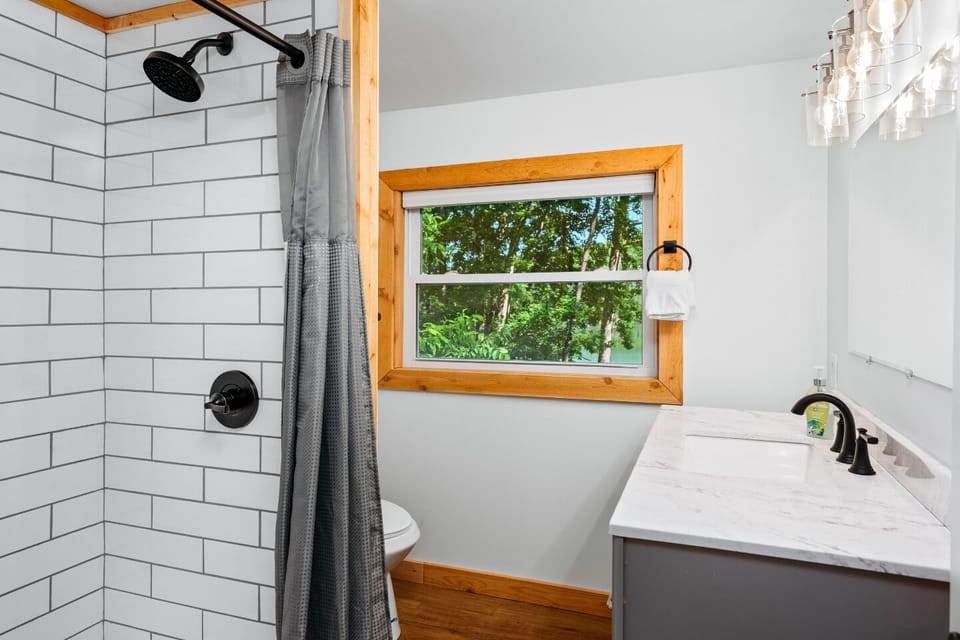 Enjoy modern fixtures, natural light, and serene views for a refreshing retreat!