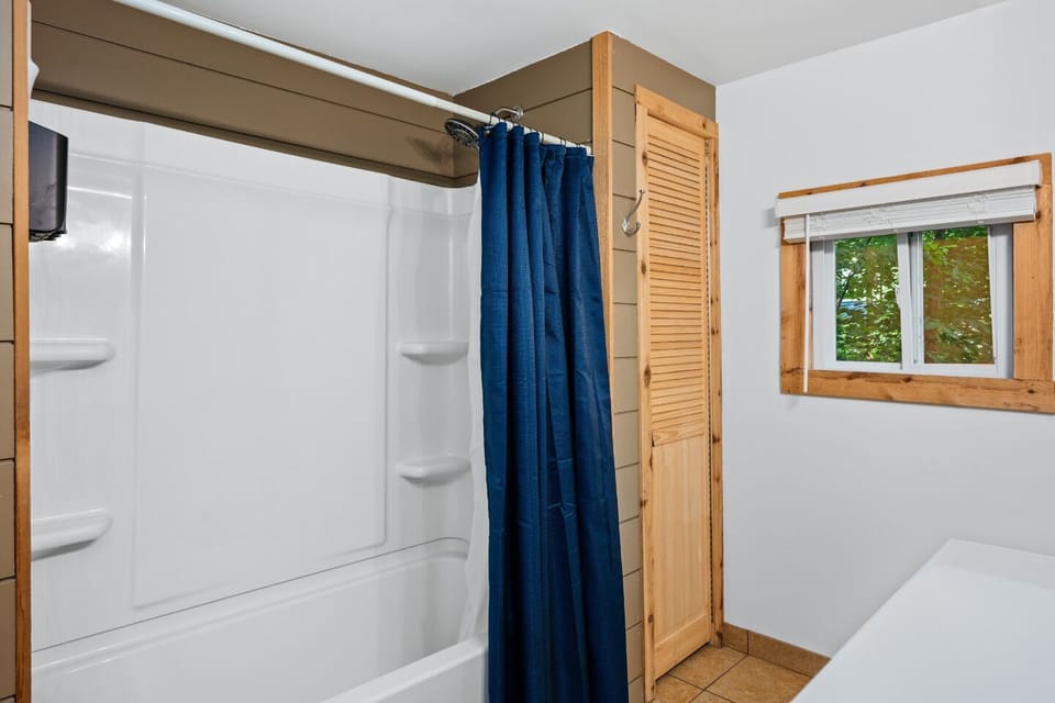 Bright and inviting, with wooden accents and a relaxing vibe!