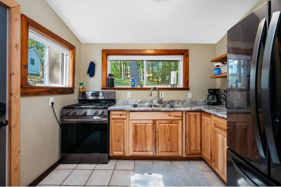 Kitchen: Bright and airy with modern appliances and a scenic view—cook up memories!