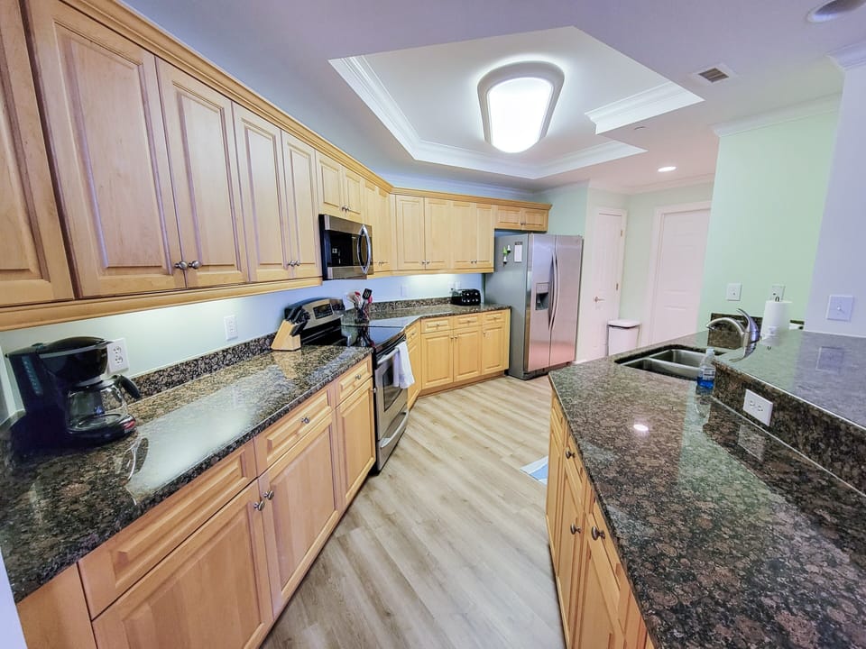 Condo, 3 Bedrooms | Private kitchen | Coffee/tea maker, fridge, oven, dishwasher