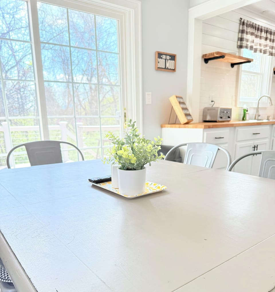 The dining room, located off the kitchen, is a perfect spot for meals or games.