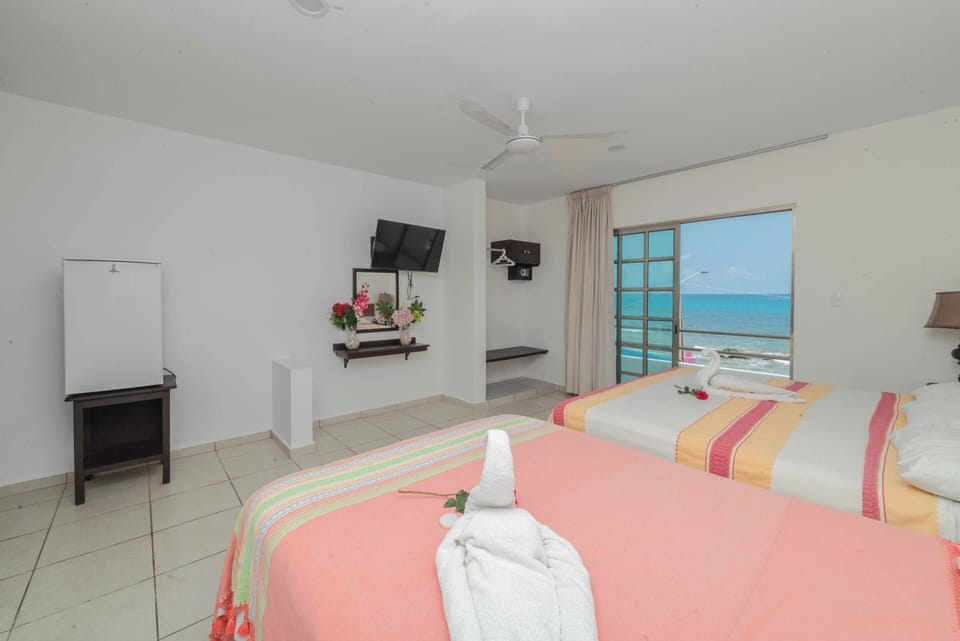 Comfort Room, 1 Bedroom, Ocean View | In-room safe, free WiFi, bed sheets