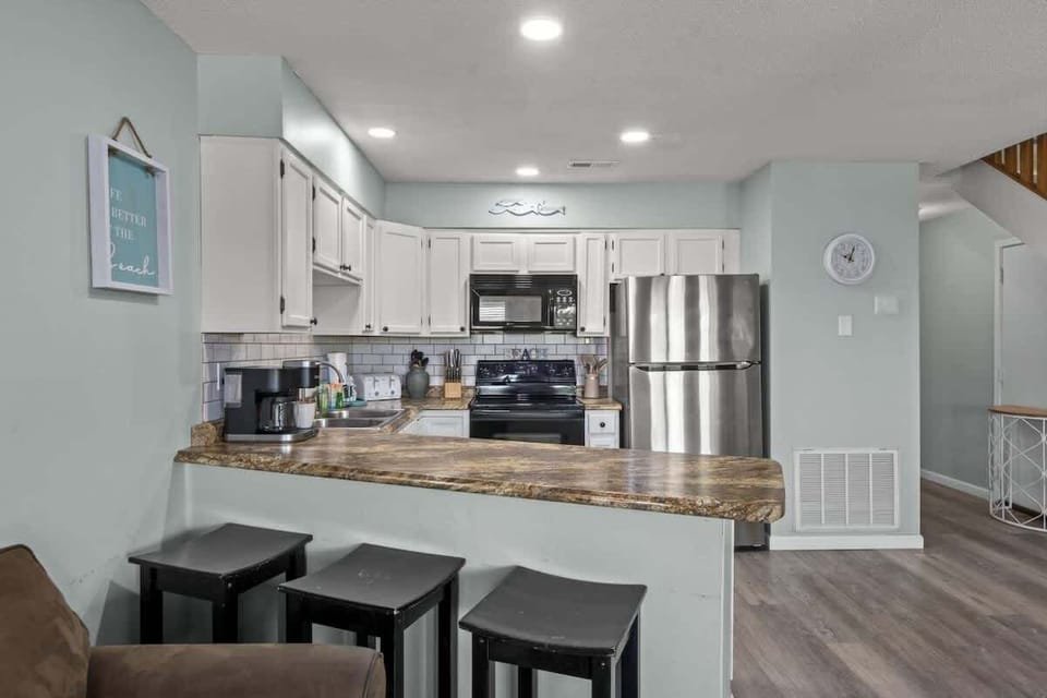 Enjoy breakfast bar seating for 3.
