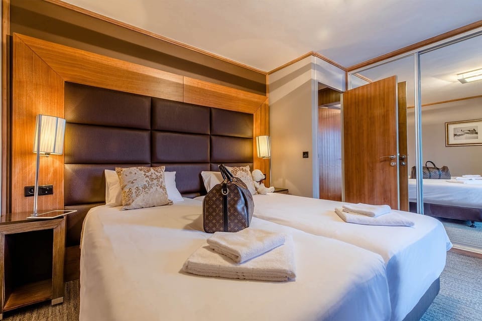 Get a peaceful night sleep in our cozy bedroom which has 2 Single beds or a Double bed.