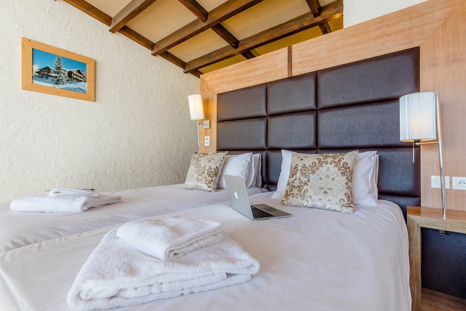 Get a good night's rest in the cozy bedroom.