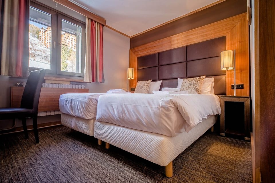 Find peace and relaxation with your close friends and family in this stunning room featuring natural decor.