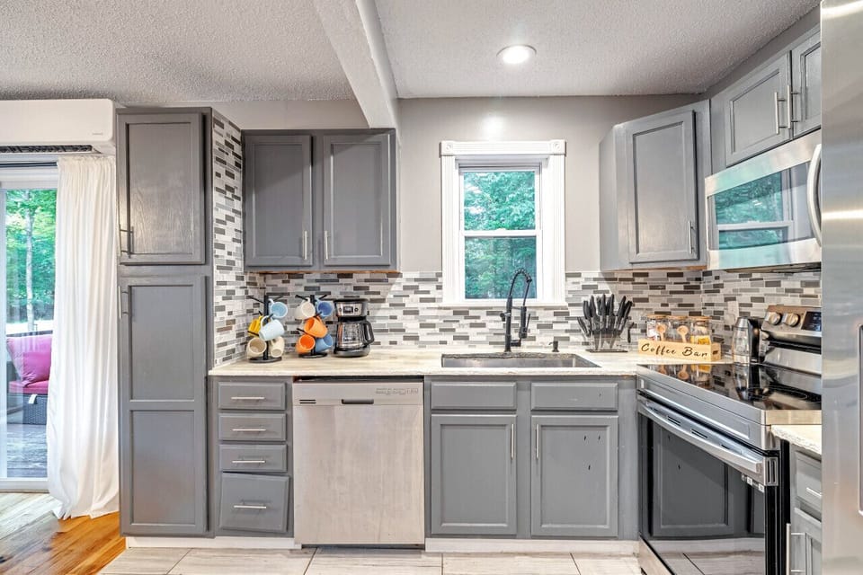 Bright, fully equipped kitchen with everything you need to prepare meals during your stay.