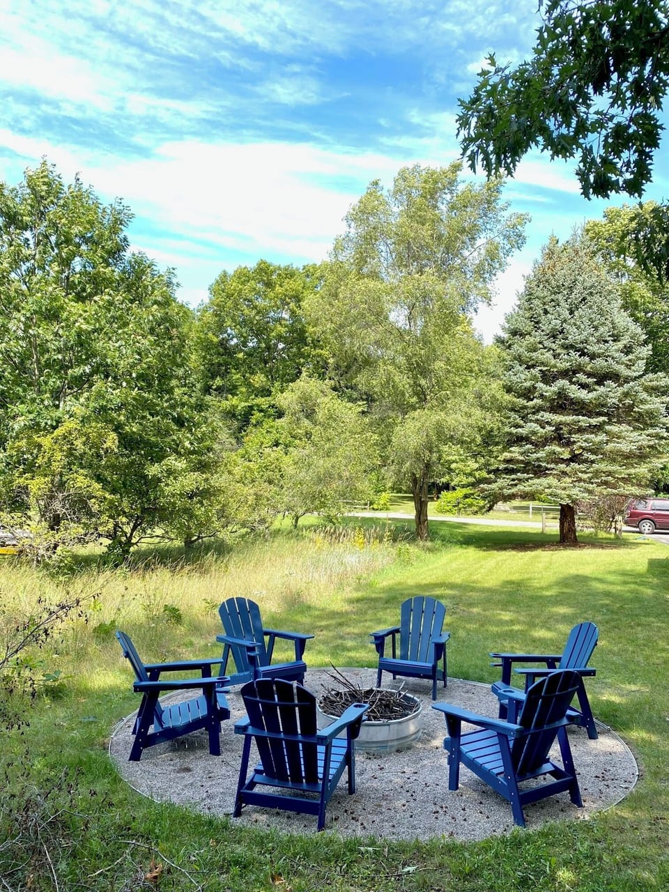Large sideyard with fire pit, perfect for yard games