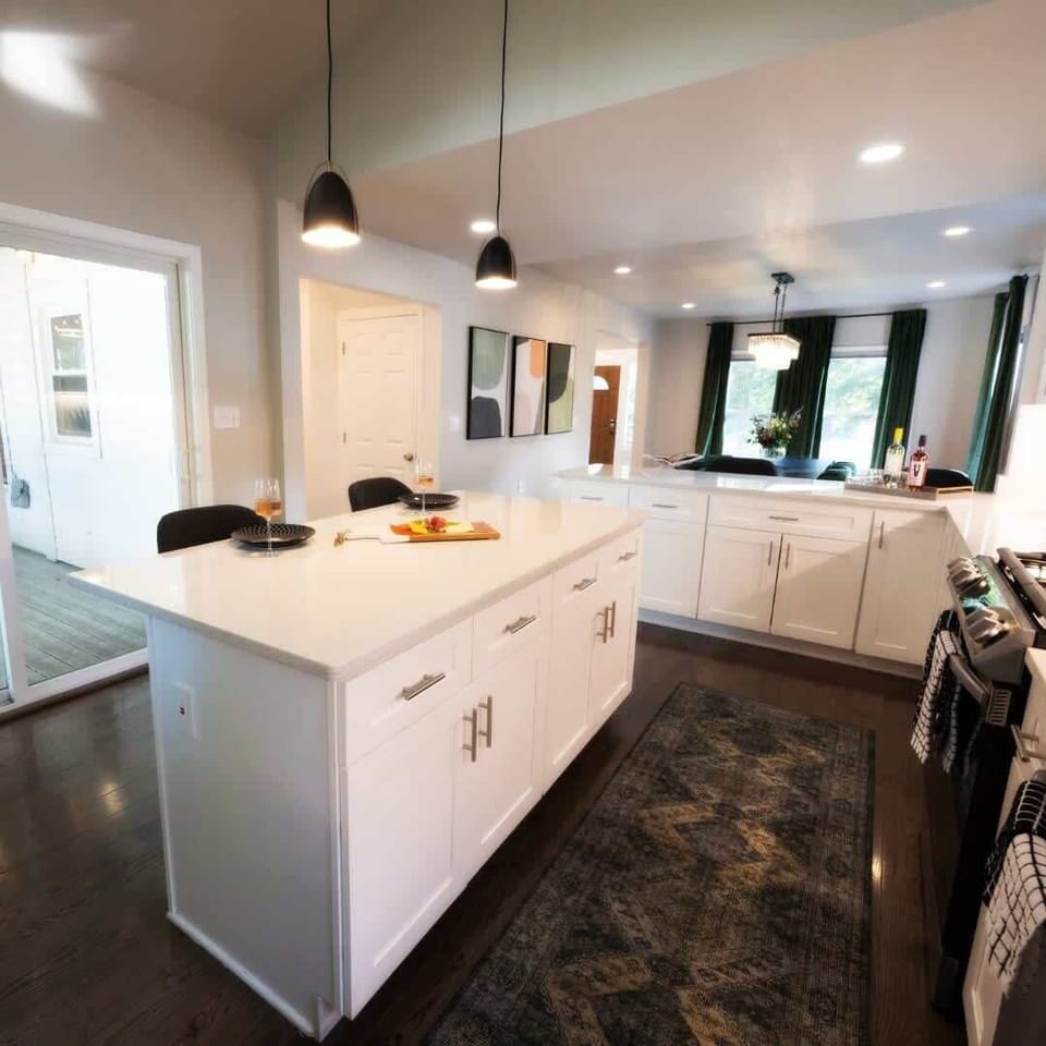 The kitchen island—sleek and spacious, perfect for meal prep or casual dining. With a polished surface and contemporary design, it’s the heart of the kitchen, where style meets function in your Cleveland getaway.