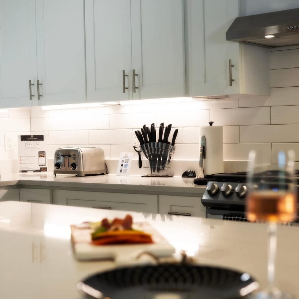 A fully functional kitchen —equipped with modern appliances, stocked cabinets, cookware, utensils, and a coffee maker. Perfect for home-cooked meals, morning brews, and effortless entertaining