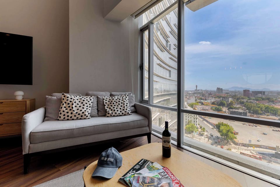 Designer Living Room with Scenic Backdrop

