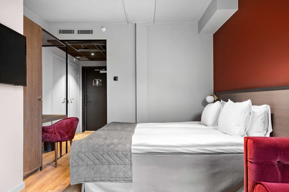 Family Room, 1 Queen Bed, Non Smoking (with Sofabed) | In-room safe, individually decorated, individually furnished, desk