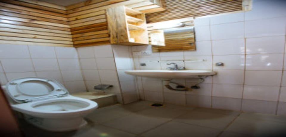 Shower, rainfall showerhead, towels, soap