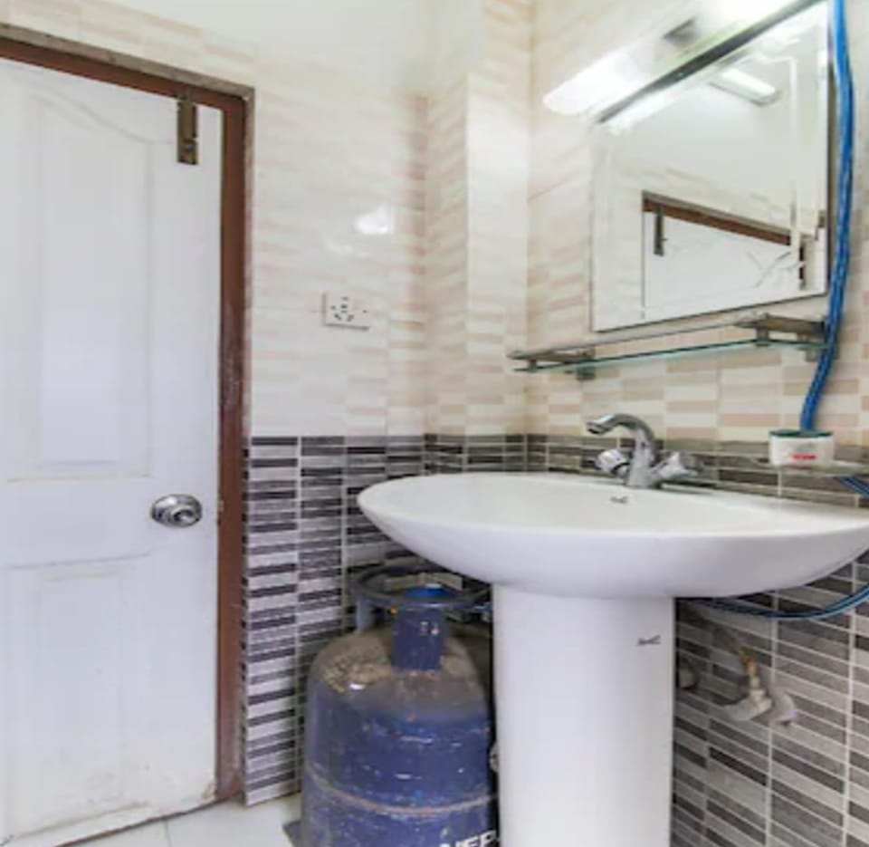 Shower, rainfall showerhead, towels, soap