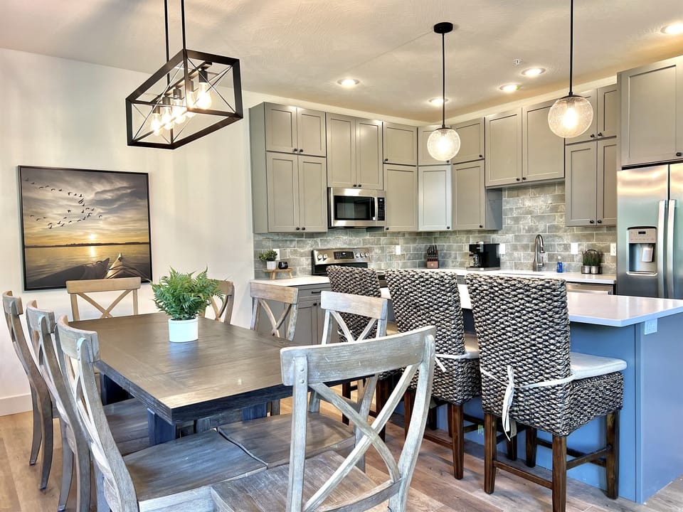 Dining and kitchen spaces with extra bar seating