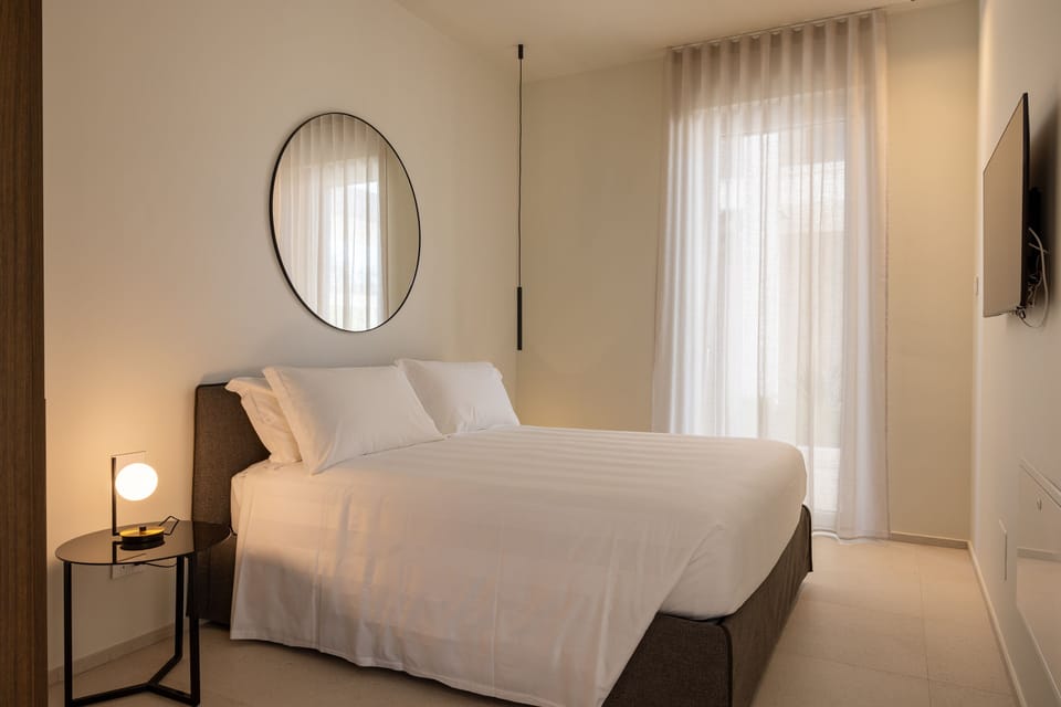 Deluxe Condo, Non Smoking, City View | Frette Italian sheets, premium bedding, memory foam beds, minibar