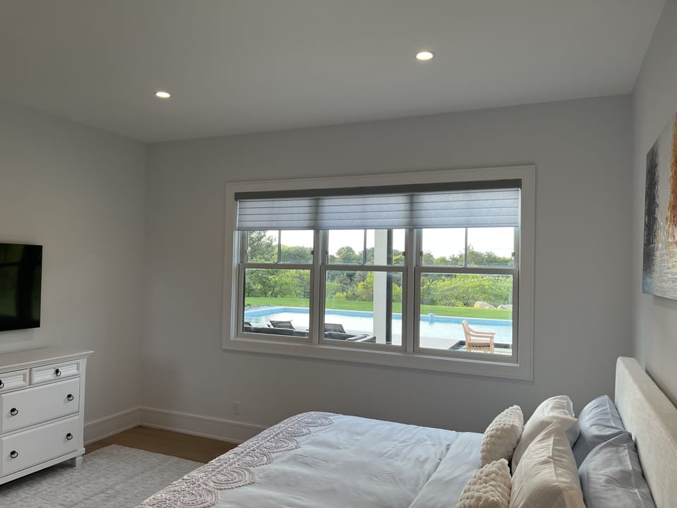 Primary Bedroom; remote controlled blinds