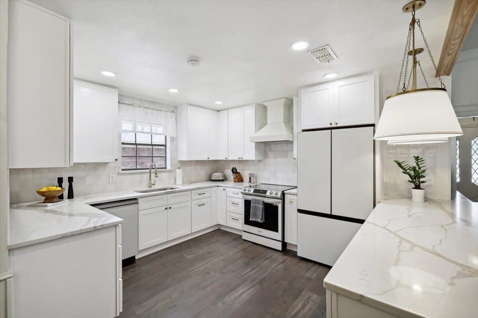 Spacious and open with plenty of counter space and all the bells and whistles one could ask for in a kitchen, this place is clearly the heart of the home!