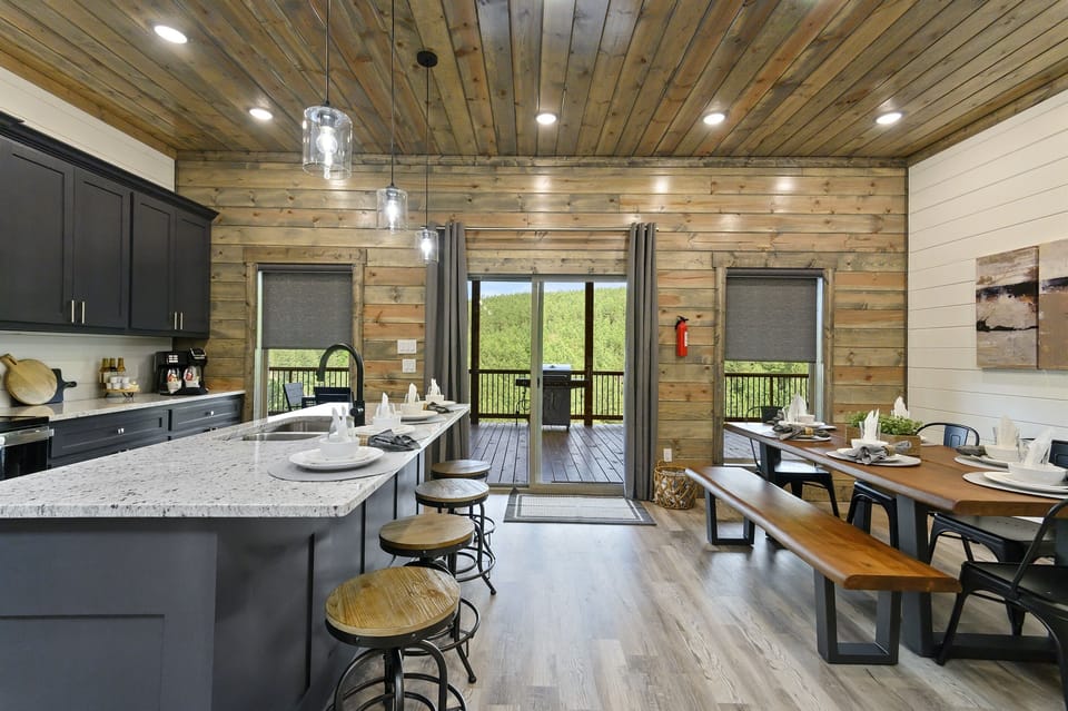 Dining are comfortably seats 8 plus 4 bar stools