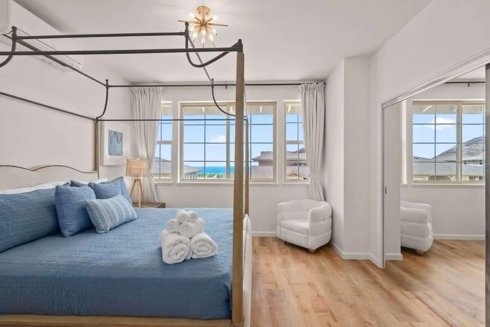 Cozy bedroom overlooking the sparkling sea