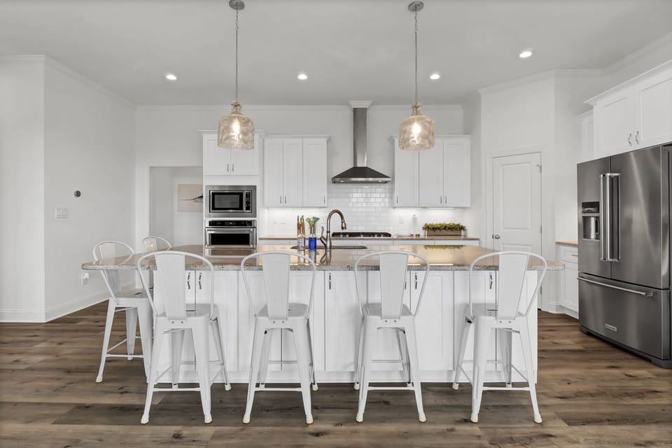 Gather around this large kitchen bar for great conversation.