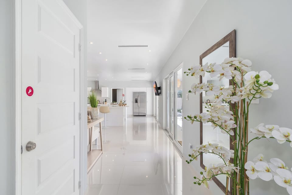Experience effortless connectivity between the living area and kitchen. - Embrace contemporary living with the seamless integration of the living area and kitchen. - Achieve a harmonious balance between relaxation and culinary delights in the vacation home