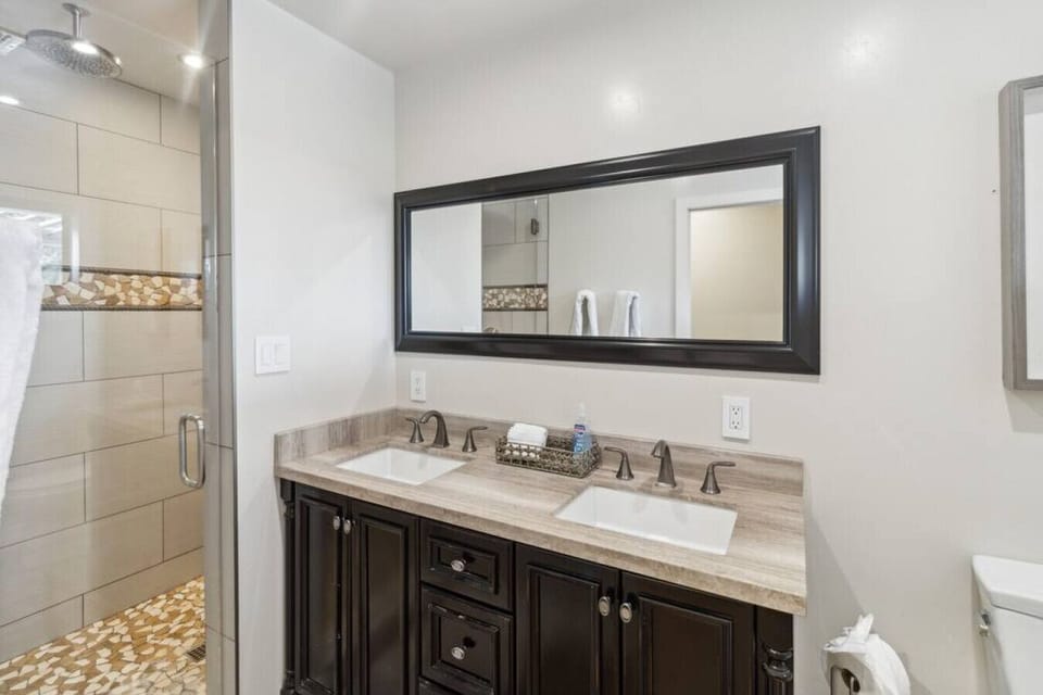 Updated bathroom with vanity and walk-in shower