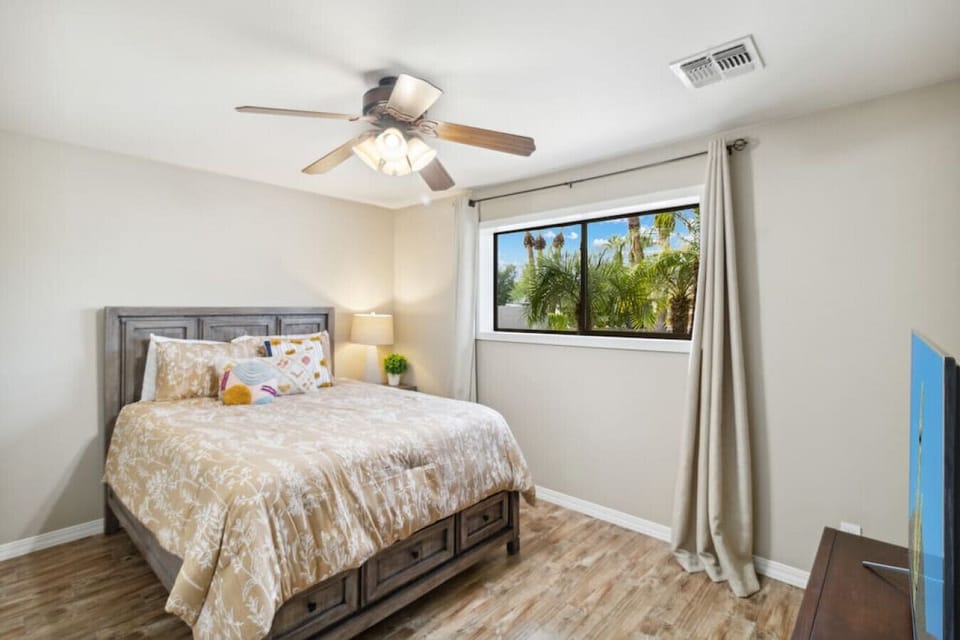 Cozy bedroom with comfortable bed and natural light
