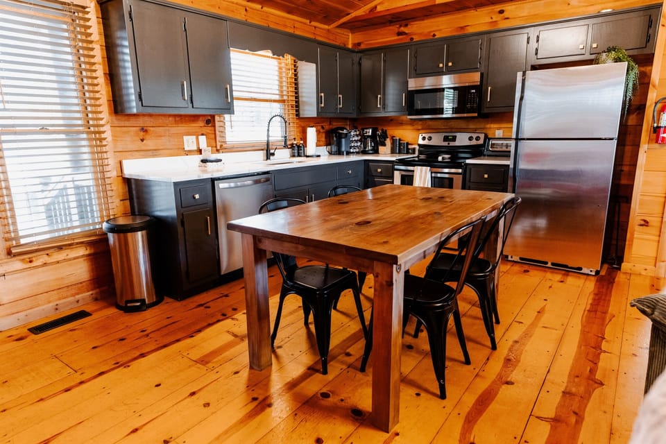The heart of the cabin. Our open kitchen keeps you connected to the dining and living areas - and the views.